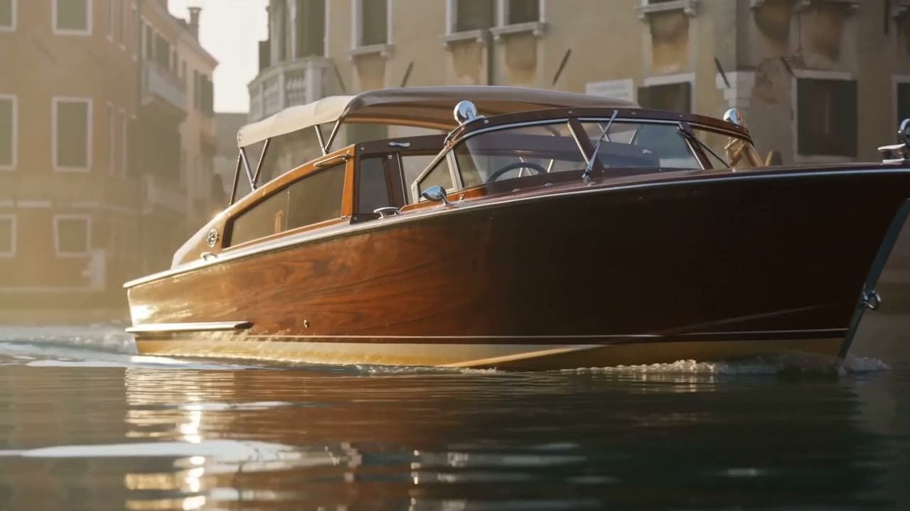 Inquadratura cinematografica di una gondola veneziana che scivola in un canale all'alba